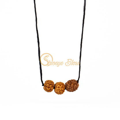 Front view of a small ASEAN 4-5-6 mukhi Rudraksha combination pendant necklace for boys, hanging against a white background